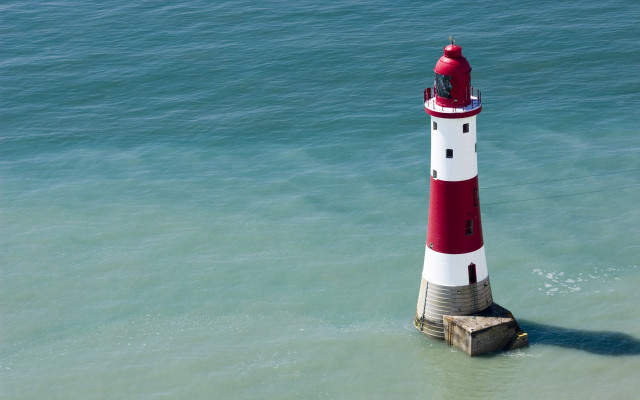 Red white lighthouse ocean pier free wallpaper for desktop - medium preview image