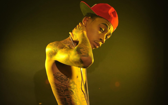 Man tattoos red hat arm free wallpaper - medium preview image