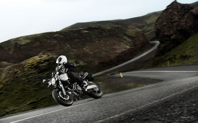 Motorcycle winding road mountainside ride free wallpaper - medium preview image