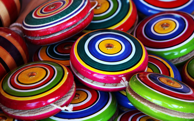 Colorful painted wooden toy discs free wallpaper - medium preview image