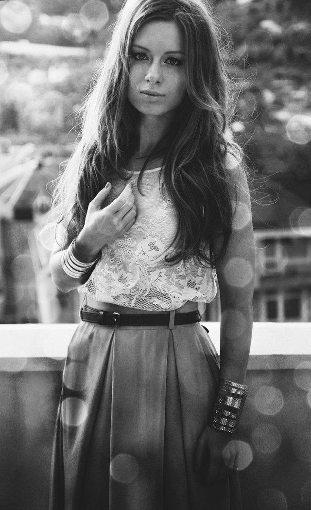 Woman balcony serious look camera free wallpaper - medium preview image