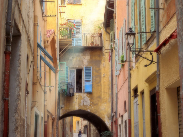Narrow alleyway person walking building #4 free wallpaper - medium preview image