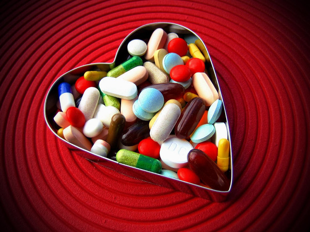 Heart shaped tin pills red free wallpaper - medium preview image