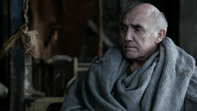 Man scarf sitting chair wall free wallpaper - medium preview image