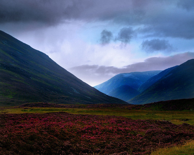 Mountain range grassy field cloudy #2 free wallpaper - medium preview image