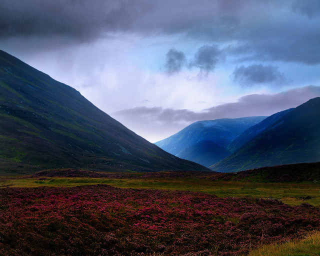 Mountain grassy field cloudy sky free wallpaper - medium preview image