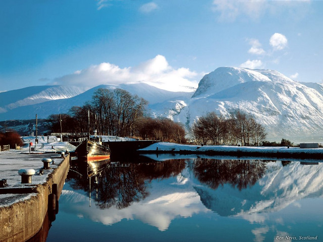Boat docked harbor mountains snow free wallpaper - medium preview image