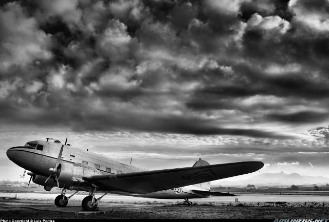 Black white plane runway cloudy free wallpaper - medium preview image