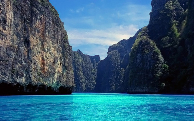 Boat mountains ocean blue sky free wallpaper - medium preview image