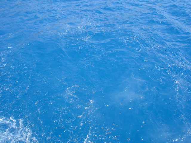 Blue ocean boat distance water free wallpaper - medium preview image