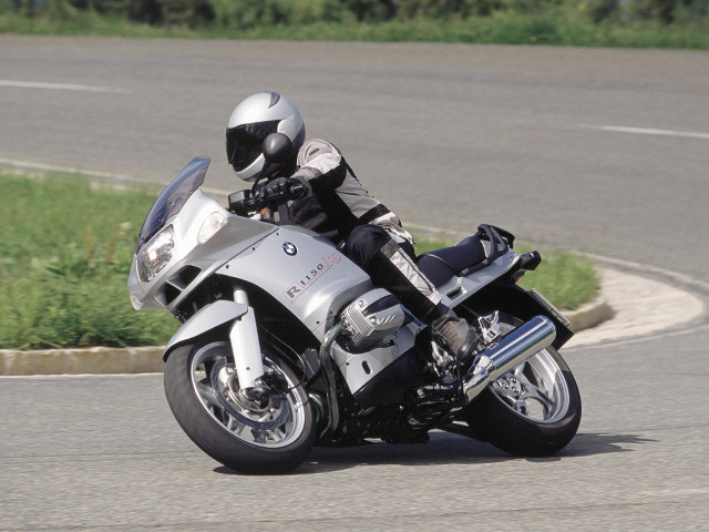 Man cybermotorcycle greenfield blurry helmet free wallpaper - medium preview image