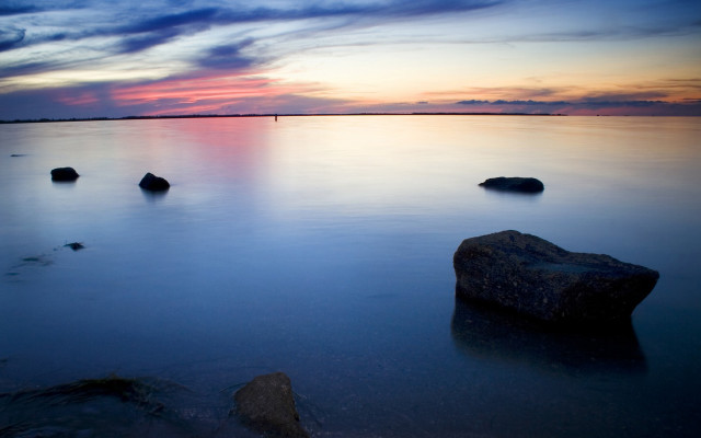 Sunset water rocks clouds sky free wallpaper - medium preview image