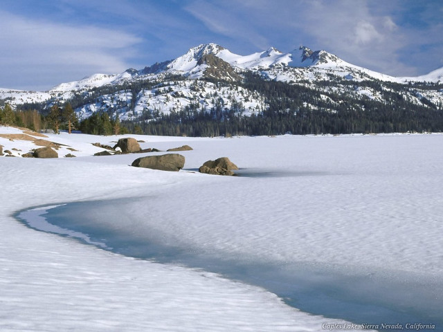 Snowy mountain range stream rocks free wallpaper - medium preview image