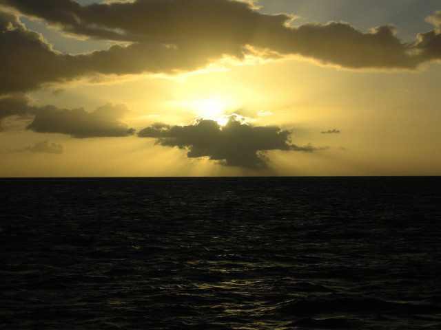 Sunshine clouds ocean boat distance #2 free wallpaper - medium preview image