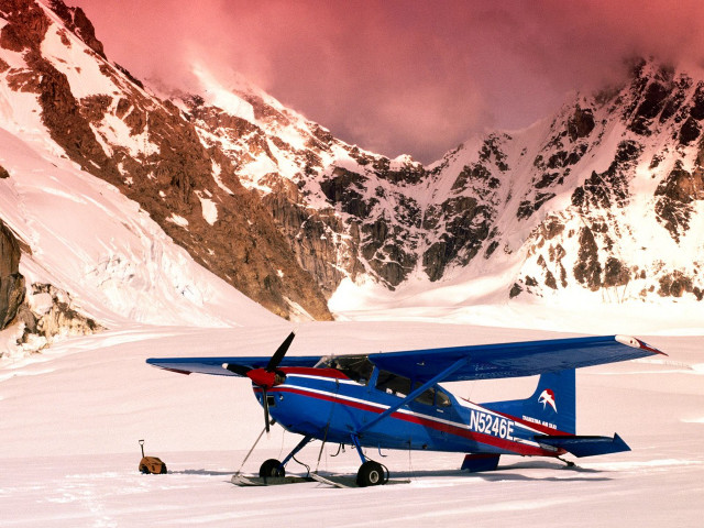 Blue airplane snowfield mountains orange free wallpaper - medium preview image