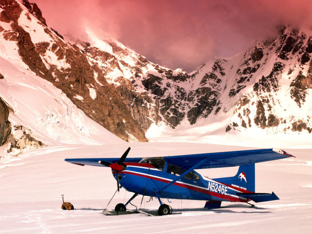 Blue airplane snow field mountains free wallpaper - medium preview image