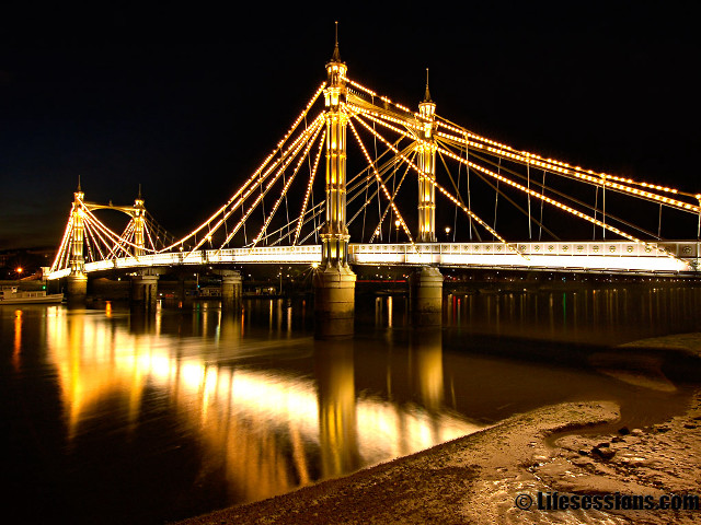 Lit bridge night reflection people free wallpaper - medium preview image