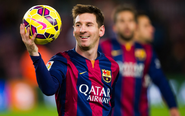 Man holding soccer ball smiling free wallpaper - medium preview image