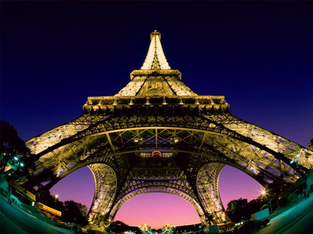 Eiffel tower lit up night free wallpaper - medium preview image