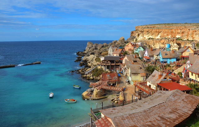 Village shore water boat cliff free wallpaper - medium preview image