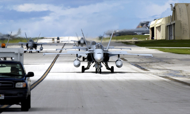 Fighter jet runway truck building free wallpaper - medium preview image