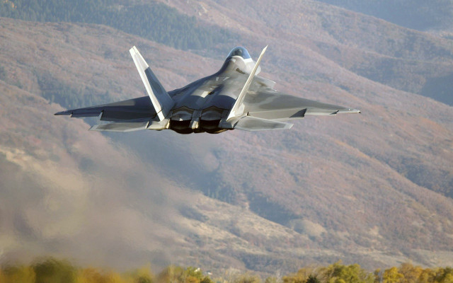 Fighter jet flying forest mountains free wallpaper - medium preview image