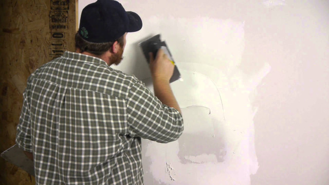 Man painting wall white paint free wallpaper - medium preview image
