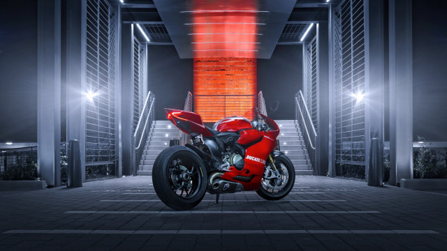 Red motorcycle parking garage staircase free wallpaper - medium preview image