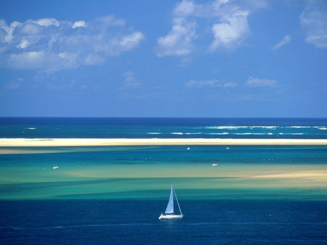 Sailboat floating ocean sky background #2 free wallpaper - medium preview image