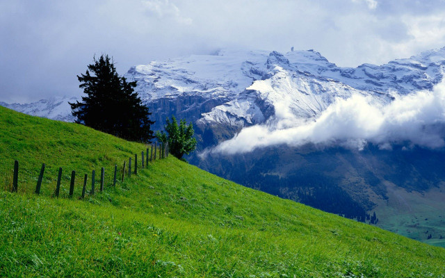 Mountain fence grassy field clouds #3 free wallpaper - medium preview image
