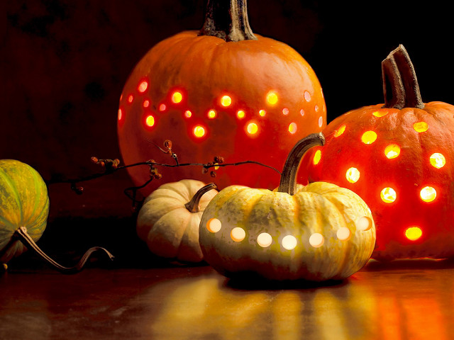 Pumpkins with lights on table #2 free wallpaper - medium preview image