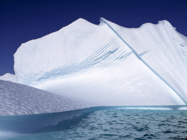 Iceberg floating ocean blue sky free wallpaper - medium preview image