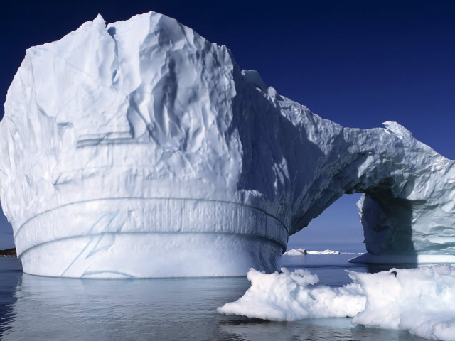 Iceberg ocean shore boat background free wallpaper - medium preview image