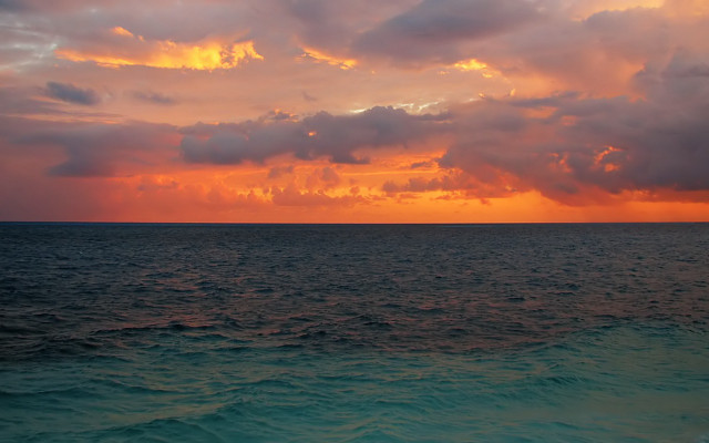 Sunset ocean clouds water boat #2 free wallpaper - medium preview image