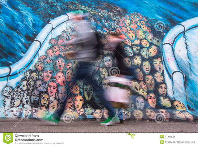 Man walking past mural large free wallpaper - medium preview image