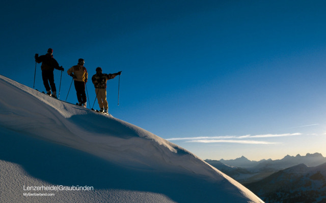 Three people snow slope skis free wallpaper - medium preview image