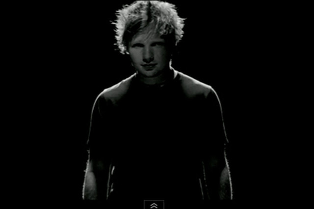Man standing dark head turned free wallpaper - medium preview image