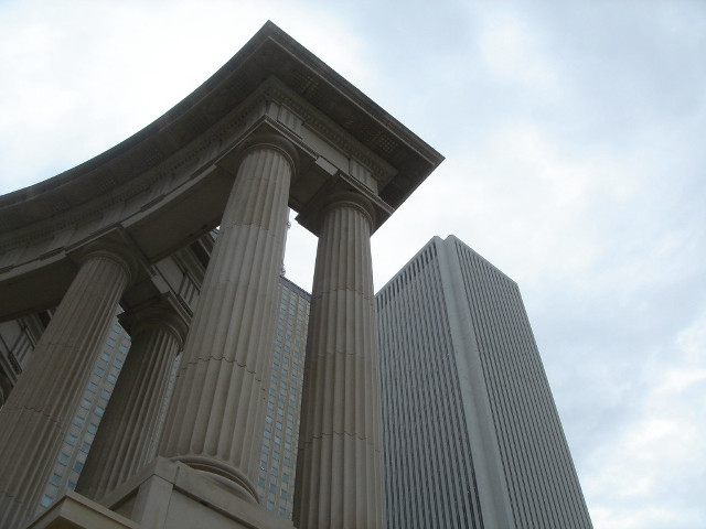 Tall building large pillars sky free wallpaper - medium preview image