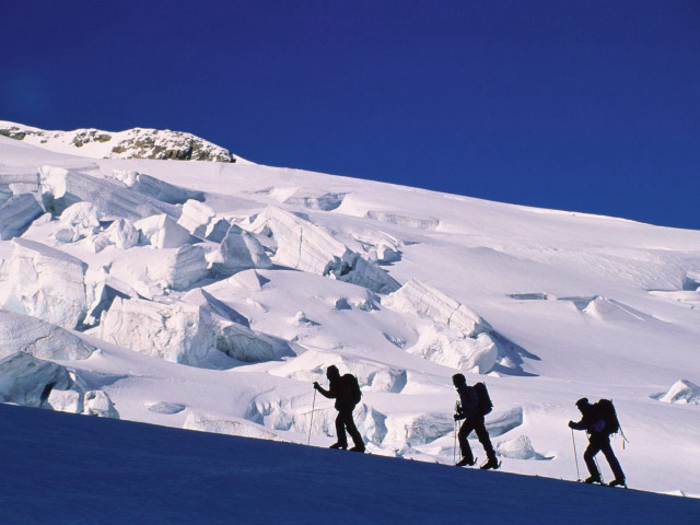 Hiking snow covered mountain skiing #2 free wallpaper - medium preview image