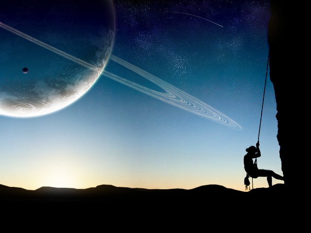 Man swinging rope planet saturn free wallpaper - medium preview image