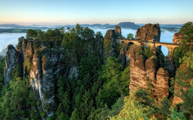 Foggy valley mountains bridge landscape free wallpaper - medium preview image