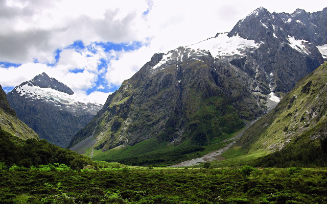 Mountain range river vegetation snow free wallpaper - medium preview image