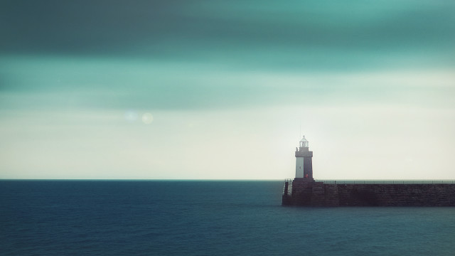 Lighthouse pier ocean cloudy sky free wallpaper - medium preview image