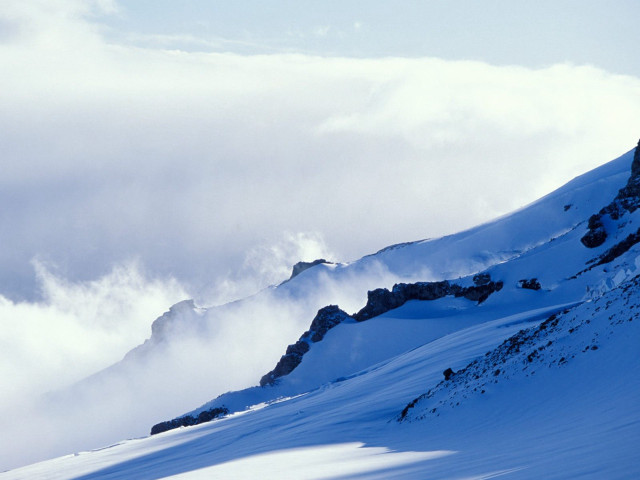 Skiing clouds mountain person snowy free wallpaper - medium preview image