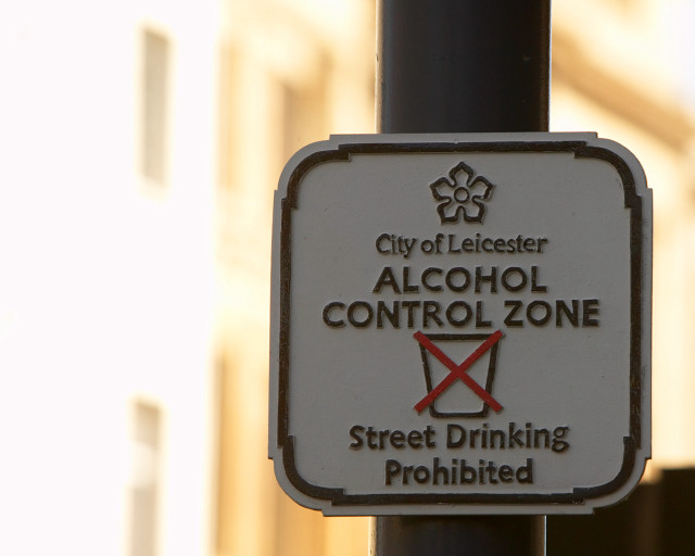 Street sign pole building sky free wallpaper - medium preview image