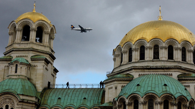 Plane cathedral cloudy golden dome free wallpaper - medium preview image