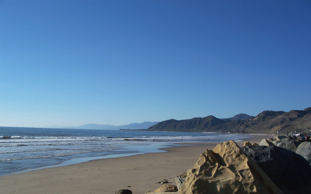 Beach rock formation ocean mountains #3 free wallpaper - medium preview image