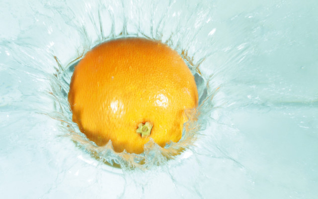 Orange water splash green background #3 free wallpaper - medium preview image