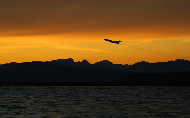 Plane flying water sunset mountains #4 free wallpaper - medium preview image