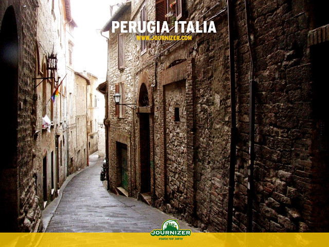 Narrow alley cobblestone street buildings free wallpaper - medium preview image